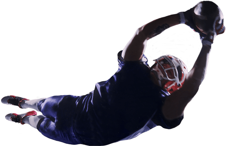 Football player making a diving catch