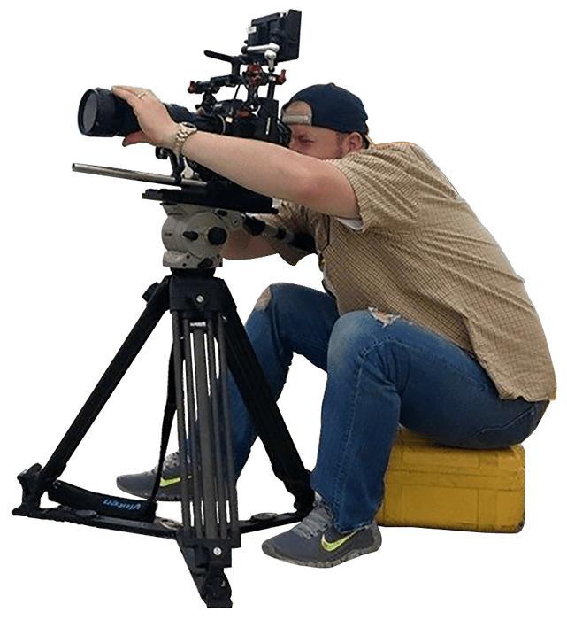 Man using a tripod camera