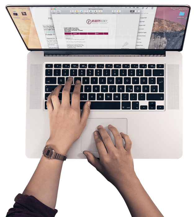Man typing on a laptop