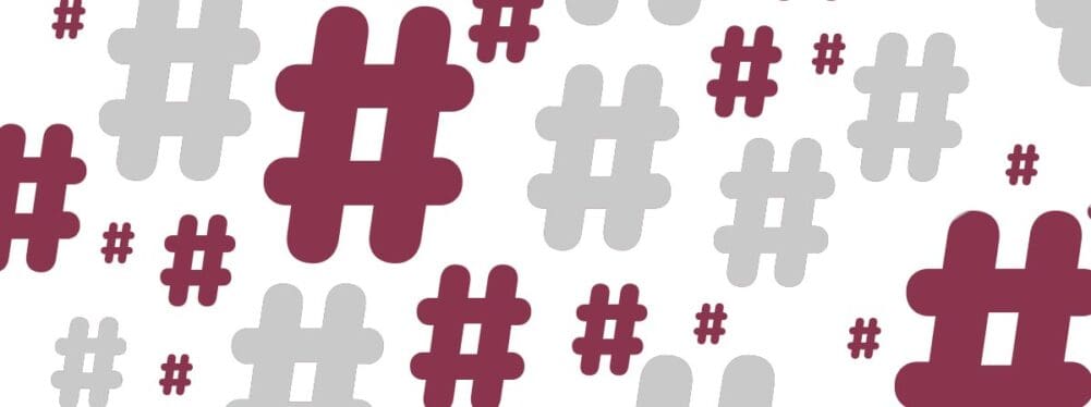 Multiple Hashtags of various sizes and alternating between grey and maroon