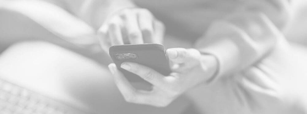 woman browsing the internet on her phone