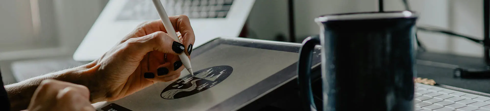 Velocity Agency Art Director working on Logo Design concepts for an upcoming campaign